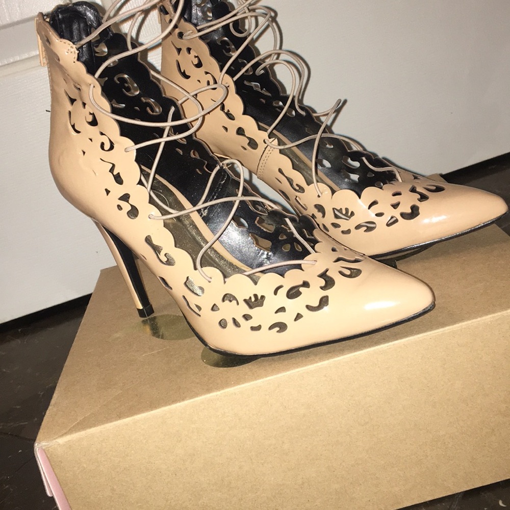 Nude cross string heels